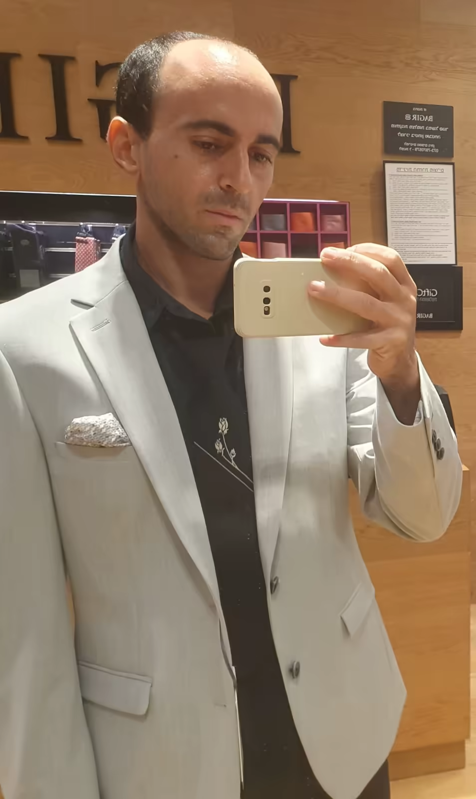 Guy Haik in a light suit